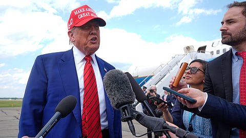 President Donald Trump speaks with reporters upon arriving at Morristown Municipal Airport in Morristown, N.J., Friday, June 20, 2025. 