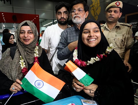 Indian students returning from Mashhad, Iran, as part of the government's Operation Sindhu, react after meeting their relatives at the Indira Gandhi International Airport, in New Delhi, Saturday, June 21, 2025. 