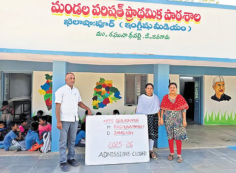 Teachers at the Mandal Parishad Primary School in Raghunathapalli mandal, Jangaon district, display an “Admission Closed” board 