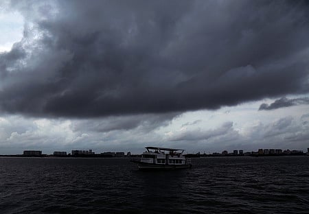Dark clouds hover over Kochi on June 22, 2025.