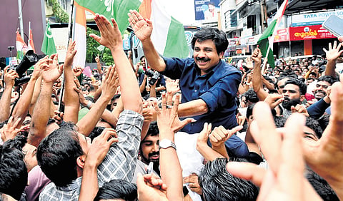 UDF’s Aryadan Shoukath greets jubilant supporters gathered in Nilambur town after his victory in the by-election on Monday 