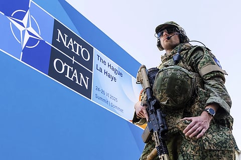 Security patrol around the perimeter of the venue in The Hague, Netherlands, Monday, June 23, 2025 ahead of the upcoming NATO summit. 