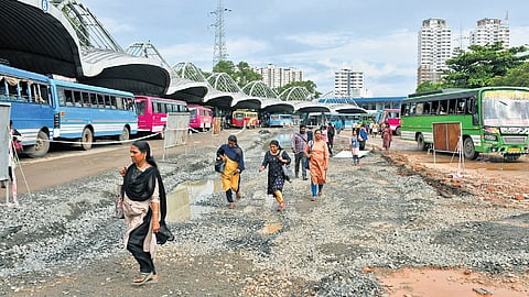 Commuters at the Vyttila Mobility Hub. TNIE had earlier highlighted the pathetic condition of the carriageway 