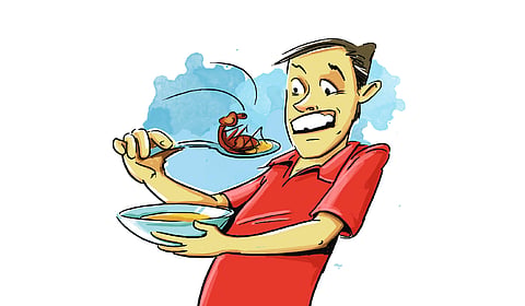 The dead lizard was found in the plate of one student