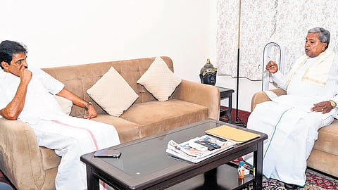 Chief Minister Siddaramaiah in conversation with AICC General Secretary KC Venugopal, in New Delhi on Wednesday 