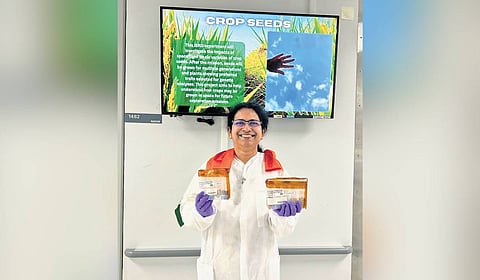 Prof K G Sreejalekshmi of IIST with the KAU-developed seeds that have been taken to the International Space Station for micro-gravity related experiments.  