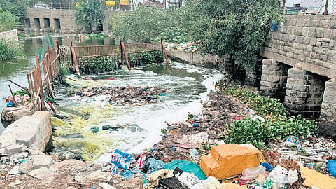 A stinky heap of garbage clogs nala near Saroornagar masjid.
