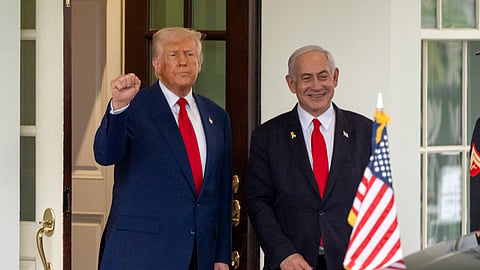 US President Donald Trump, left, stands with Israel's Prime Minister Benjamin Netanyahu at the West Wing of the White House, April 7, 2025, in Washington. 