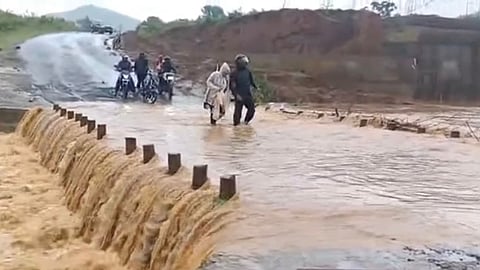 Rainwater flowing over Bangalaguda bridge on Wednesday 