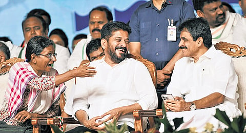 AICC Telangana in-charge Meenakshi Natarajan, CM A Revanth Reddy and AICC general secretary KC Venugopal share a lighter moment during the Samajika Nyaya  Samara Bheri public meeting.