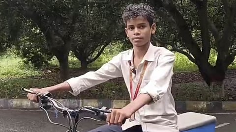Rajapu Siddu, an Intermediate second year student with his e-cycle 