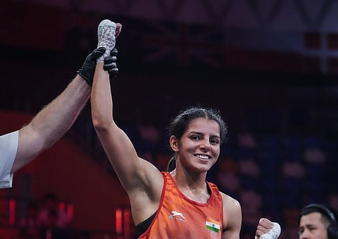 Sakshi Chaudhary (54kg) celebrates after winning the gold-medal bout at World Boxing Cup in Astana on Sunday


