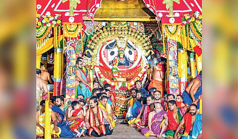 Lord Jagannath decked up in golden attire atop the chariot on Sunday 