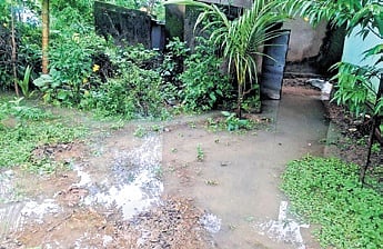 A house affected by flooding in Kuchinda.