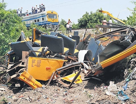The mangled remains of the school van.