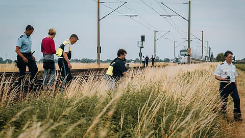 Police and forensic experts investigate a high-speed ICE train on July 3, 2025 near the village of Strasskirchen, Bavaria, after a man had attacked several passengers with "dangerous objects". 