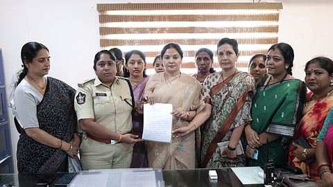 Kovur MLA Vemireddy Prashanthi Reddy submitting a complaint to Additional S P at the district police office in Nellore city. 