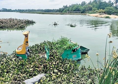An autorickshaw dumped in Yele Mallappa Lake highlights the sad state of affairs at the water body. 