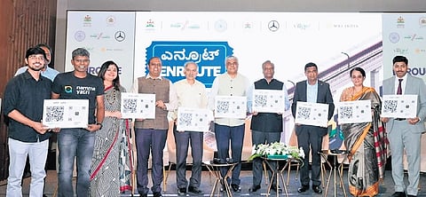 IT and BT Minister Priyank Kharge unveils the new public transit features powered by open data  in Tummoc and Namma Yatri apps, in Bengaluru on Thursday.