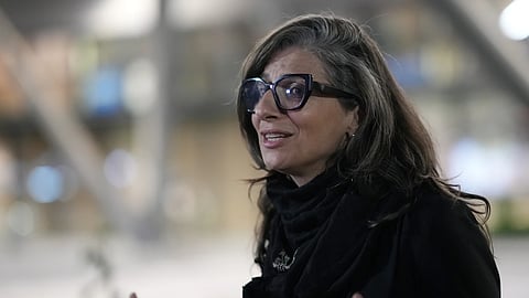 UN Special Rapporteur for the Occupied Palestinian Territories Francesca Albanese talks to The Associated Press at the Sarajevo airport in Sarajevo, Bosnia and Herzegovina, Thursday, July 10, 2025, on her way to events commemorating the 30th anniversary of the Srebrenica genocide. 