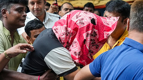 A student of the Indian Institute of Management-Calcutta (IIM), accused in the alleged rape of woman student inside a hostel of the business school, being produced at a city court, in Kolkata, West Bengal, Saturday, July 12, 2025. 