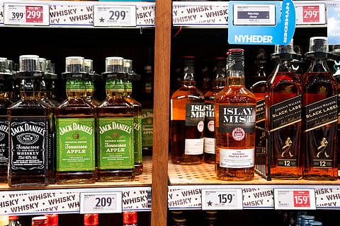 FILE - Bottles of spirits are labeled with a star in Bilka in Randers, Denmark, making it easier for customers to buy European goods, Monday, March 17, 2025.