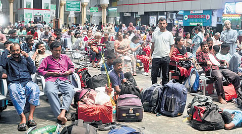 Passengers stranded at Chennai Central station after services were disrupted on Sunday 