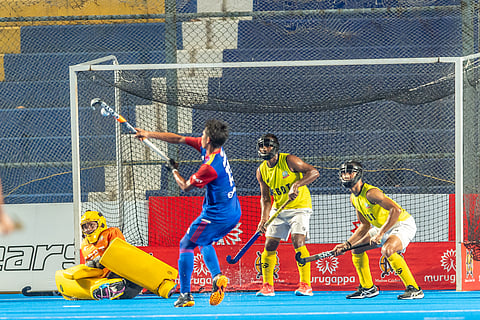 Malaysian player Muhd Danish Aiman opening the score for his team