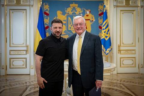 In this photo provided by the Ukrainian Presidential Press Office, Ukrainian President Volodymyr Zelenskyy, left, and United States Special Envoy for Ukraine and Russia, Joseph Keith Kellogg pose for a photo in Kyiv, Ukraine, Monday, July 14, 2025. 