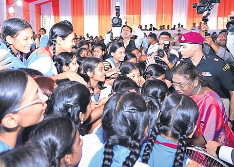 President Murmu interacting with students at Ravenshaw Girls’ High School 