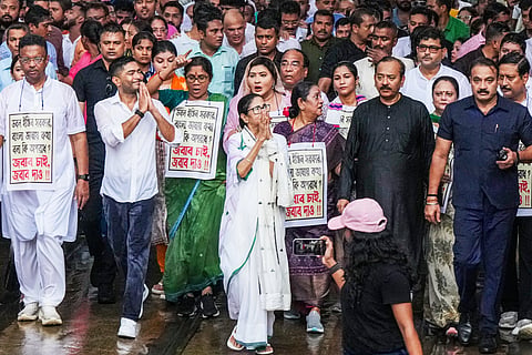 West Bengal Chief Minister and TMC chief Mamata Banerjee along with party National General Secretary Abhishek Banerjee and other leaders participates in a protest march against the alleged harassment of Bengali-speaking people in BJP-ruled states, in Kolkata, West Bengal, Wednesday, July 16, 2025. 