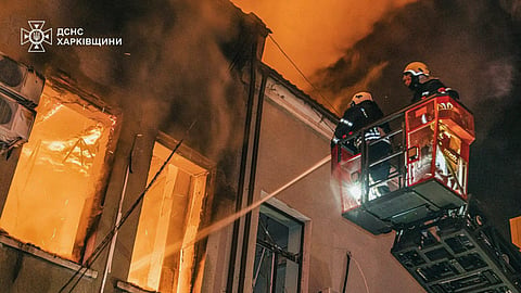 This handout picture taken and released by the Ukrainian State Emergency Service on July 16, 2025, shows firefighters extinguishing a fire after a Russian strike in the Vinnytsya region. 