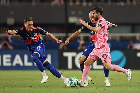 Lionel Messi #10 of Inter Miami CF controls the ball whilst under pressure from Brad Smith #14 and Corey Baird #11 of FC Cincinnati during the MLS match between FC Cincinnati and Inter Miami CF at TQL Stadium on July 16, 2025 in Cincinnati, Ohio. 