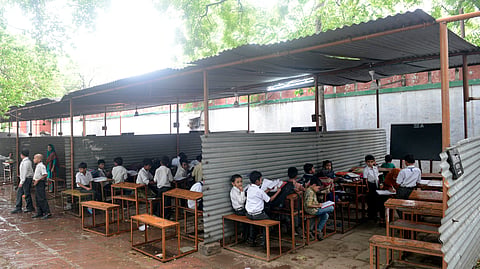 School children at Qaumi Senior Secondary School, run inside Eidgah near Jhandewala, New Delhi