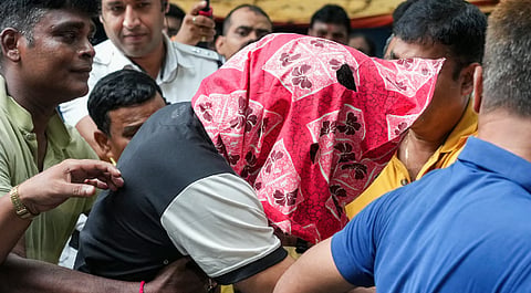 A student of the Indian Institute of Management-Calcutta (IIM), accused in the alleged rape of woman student inside a hostel of the business school, being produced at a city court, in Kolkata, West Bengal, Saturday, July 12, 2025. 