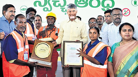 CM Chandrababu Naidu honouring sanitation workers in Tirupati as part of Swarna Andhra-Swachh Andhra event 