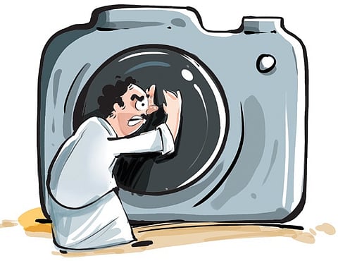 The click of Karthik’s camera had them rattled. Not because they were camera shy — but because they were busy scooping up sand 