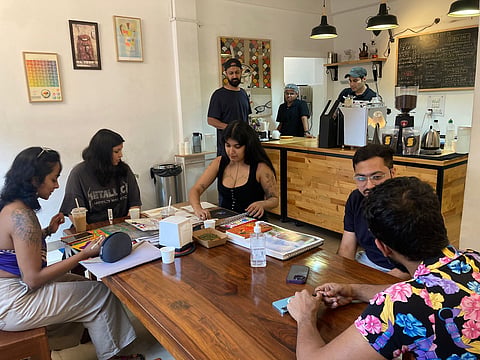 People gathered at Shack Coffee Co 