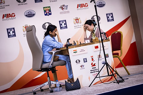 Divya Deshmukh reacts on the cusp of victory versus Tan Zhongyi 