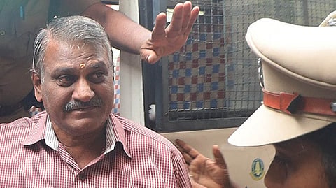 Ex-inspector Sridhar brought to  court in Madurai.