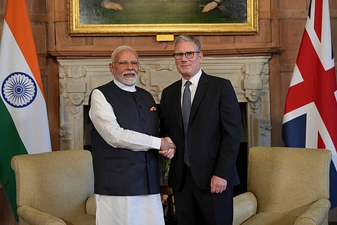 In this image released by PMO on July 24, 2025, Prime Minister Narendra Modi with his British counterpart Keir Starmer during a meeting at Chequers Estate, in UK. 