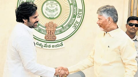 Deputy Chief Minister Pawan Kalyan greets Chief Minister N Chandrababu Naidu at the State Cabinet meeting on Thursday. 