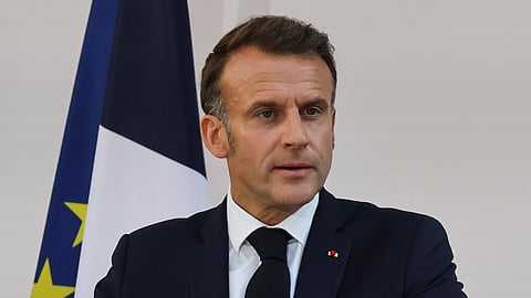 French President Emmanuel Macron speaks to the army leaders at the Hotel le Brienne, Sunday, July 13, 2025, ahead of the Bastille Day parade in Paris. 