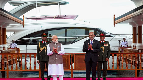 Prime Minister Narendra Modi receives a ceremonial welcome upon his arrival in Male, Maldives. Maldivian President Mohamed Muizzu is also seen. 
