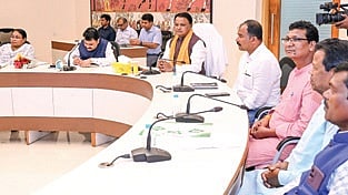 CM Mohan Charan Majhi with members of Adivasi Mahasangh 