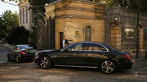 Cars, which are believed to carry European diplomats, enter the Iranian consulate ahead of a meeting with Iranian counterparts for talks over Tehran's nuclear program, in Istanbul, Turkey, Friday, July 25, 2025. 