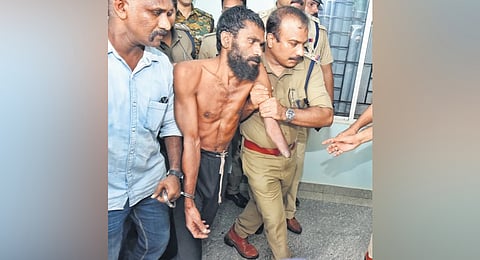 Govindachamy being taken to the Kannur Police Training Centre on Friday 