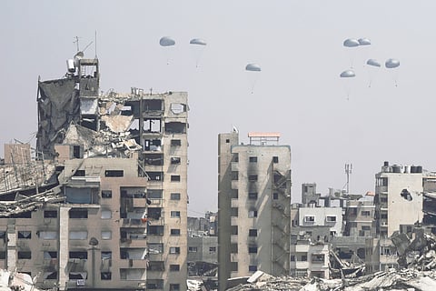 Humanitarian aid is airdropped to Palestinians over Gaza City, Gaza Strip, Monday, July 28, 2025. 