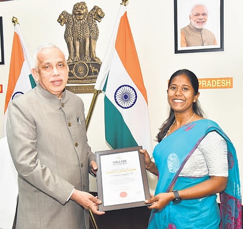 Governor Justice S. Abdul Nazeer felicitated Major Kavitha Vasupalli, VSM, for her exceptional achievement in adventure sports 