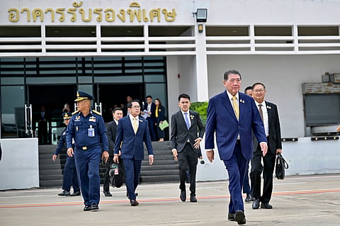 Thailand's acting Prime Minister Phumtham Wechayachai, front, departs from Military Airport in Bangkok, to Malaysia, to attend a meeting to discuss regional peace at the Prime Minister's Office of Malaysia, with Cambodian Prime Minister Hun Manet, Monday, July 28, 2025. 